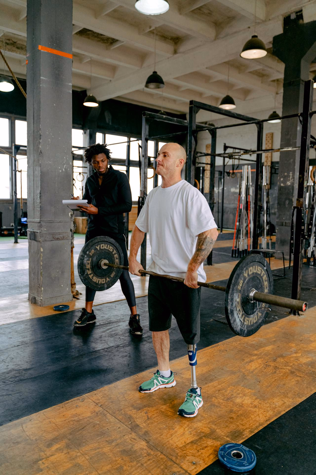 A Man Working Out in the Gym